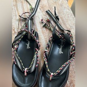 Free People sandals with ribbon to be tied around the ankles. Size 10